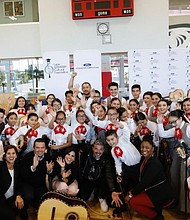 Becky Villaescusa, Joe Ávila, Karina Banda, Pedro Capó and Ms. Melinda Jean-Baptiste with the students at the Latin GRAMMY® In The Schools event in Chicago
Credit: The Latin Recording Academy/Photographer: Jeff Schear/Getty Images