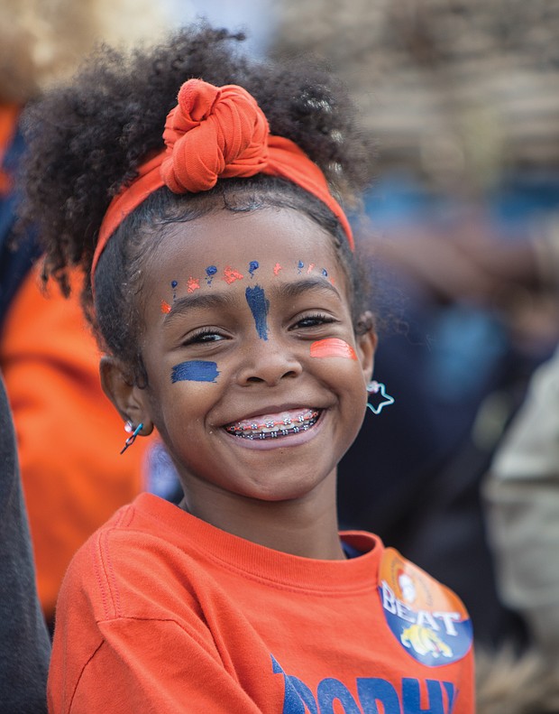 Emma Hairston, 10, is dressed head to toe in the colors of VSU — orange and blue.