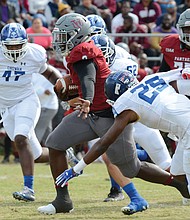 Virginia Union University running back Tabyus Taylor slips past the Chowan University defense during the homecoming game last Saturday at Hovey Field, helping the Panthers to a 41-34 victory.