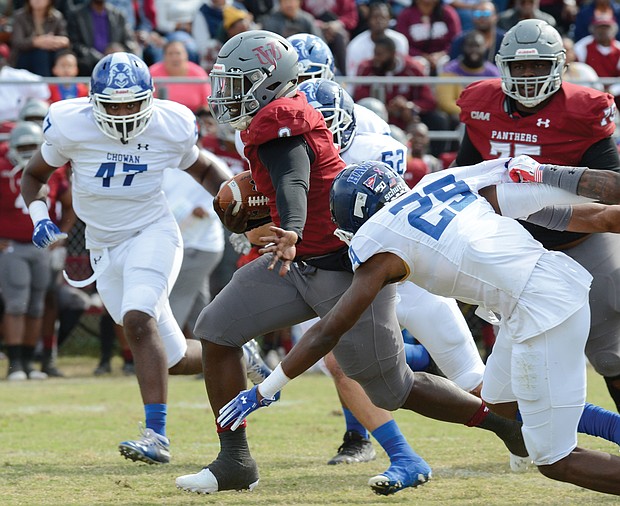 Virginia Union University running back Tabyus Taylor slips past the Chowan University defense during the homecoming game last Saturday at Hovey Field, helping the Panthers to a 41-34 victory.