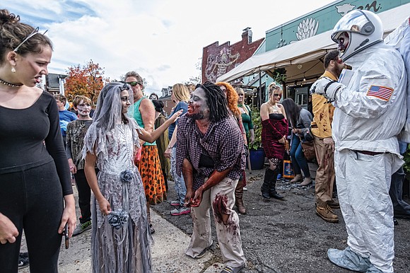 Carytown was filled with the living dead last Saturday as scores of ghoulishly costumed people participated in the 15th Annual ...