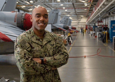 Douglas, a 2003 graduate of Paul Laurence Dunbar High School, is a yeoman with Electronic Attack Squadron (VAQ) 139, a ... Douglas, a 2003 graduate of Paul Laurence Dunbar High School, is a yeoman with Electronic Attack Squadron (VAQ) 139, a ...