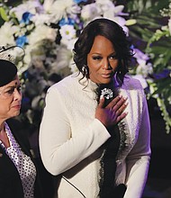 Maya Rockeymoore Cummings enters the sanctuary of New Psalmist Baptist Church for the funeral of her husband, the late Rep. Elijah E. Cummings.