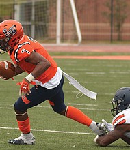 Lincoln University’s Deontae Brockington makes some headway before being taken down by the Virginia State University defense in last Saturday’s game at the school in Pennsylvania. VSU defeated Lincoln 33-5.