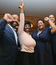 Members of the Virginia Legislative Black Caucus cheer the gains made in Tuesday’s election that will boost their membership numbers to 23 when the General Assembly convenes in January. They are, from left, Delegates Jeffrey M. Bourne, Lashrecse D. Aird, Marcia “Cia” Price and Jerrauld C. “Jay” Jones.