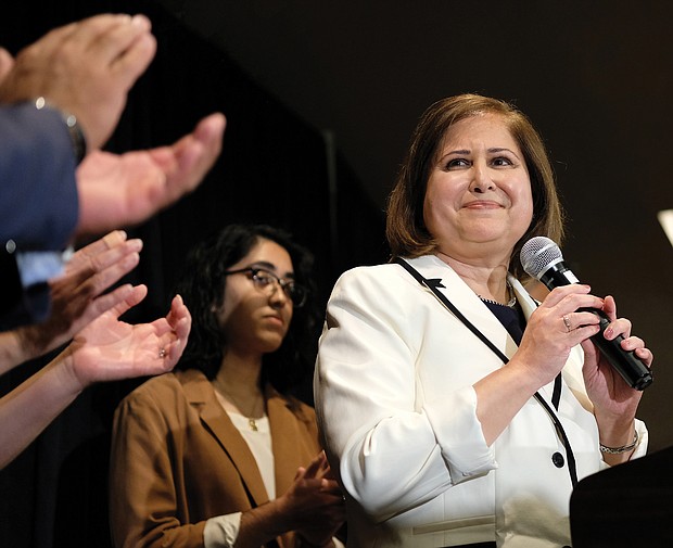 Ghazala F. Hashmi receives cheers and applause from supporters as she takes the stage to address the crowd at the Democrats’ victory party Tuesday night after her upset win in the Richmond area’s 10th Senate District. She is the first Muslim elected to the state Senate.