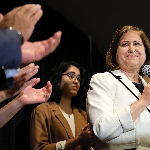 Ghazala F. Hashmi receives cheers and applause from supporters as she takes the stage to address the crowd at the Democrats’ victory party Tuesday night after her upset win in the Richmond area’s 10th Senate District. She is the first Muslim elected to the state Senate.