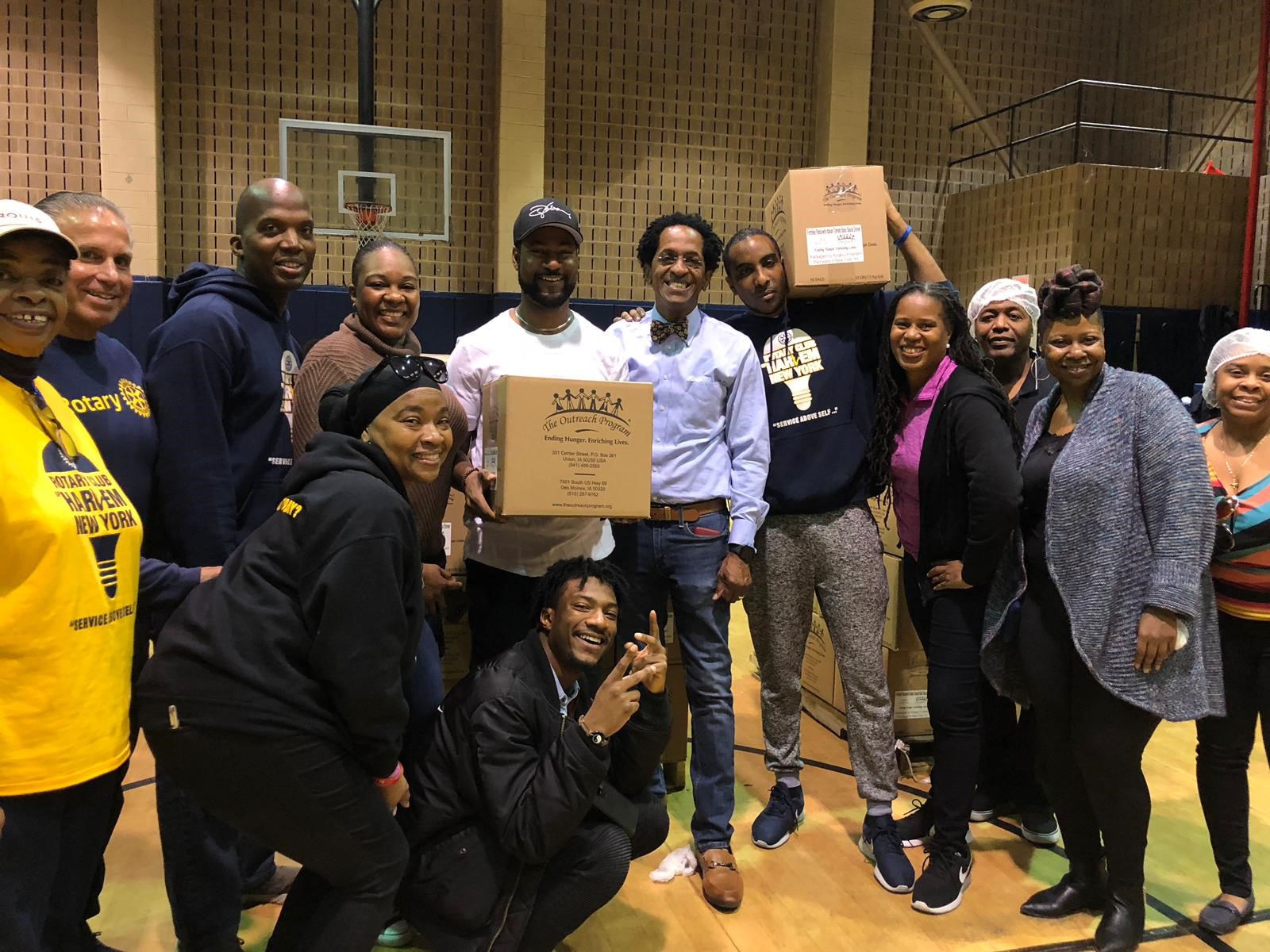 Rotary Club For Harlem Packages Food For Local Pantries And The