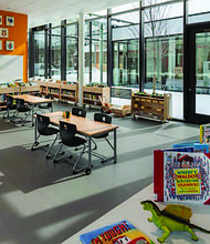 The newly renovated Whitney M. Young Library branch, 415 E. 79th St., now has a toddler section as well as a music studio, community rooms, parking lot, and an outdoor patio. Photo credit: By Wendell Hutson