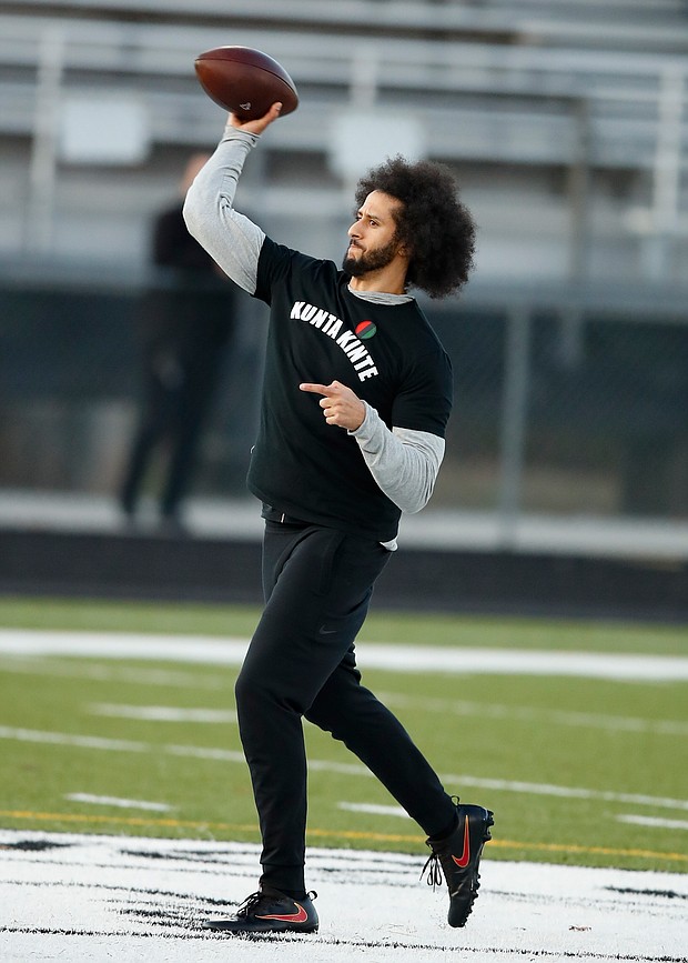 Former NFL quarterback Colin Kaepernick participates in a workout for NFL scouts and the media last Saturday at a high school field in Riverdale, Ga.