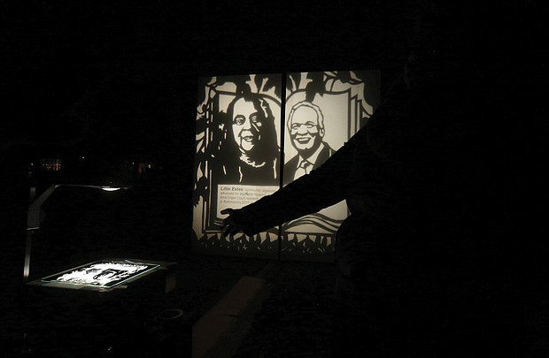 The installation “A Garden of Illuminated History” by Detroit-based artist Carrie Morris, a Midlothian native, illuminates figures of late activist Lillie Estes and Raymond H. Boone Sr., the late founder and publisher of the Richmond Free Press.