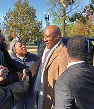 Media mogul Byron Allen is surrounded by supporters after leaving the U.S. Supreme Court, where arguments were heard Nov. 13 in his lawsuit against Comcast.
