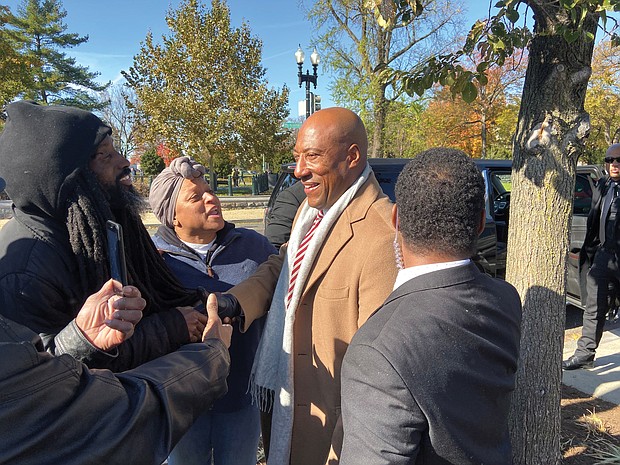 Media mogul Byron Allen is surrounded by supporters after leaving the U.S. Supreme Court, where arguments were heard Nov. 13 in his lawsuit against Comcast.