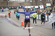 The first place winner in the women’s division also is from Ethiopia. She is Ayantu Dakebo Hailemariyan, 23, crossing the finish line, left, at 2:36:19.