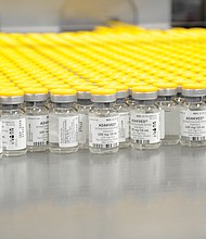 Vials of Adakveo, a new drug by Novartis, are lined up for distribution to help patients with sickle cell anemia.