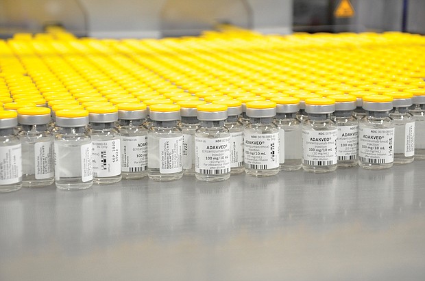 Vials of Adakveo, a new drug by Novartis, are lined up for distribution to help patients with sickle cell anemia.