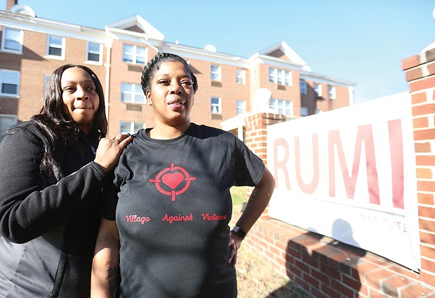 Kele A. Wright, left, and Shavon M. Ragsdale are seeking to turn grief into positives for the community through their organization, The Village Against Violence. They stand in front of the Richmond Urban Ministry Institute, 3000 Chamberlayne Ave., where the group is based.