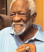 Bill Russell shows off his Basketball Hall of Fame ring.