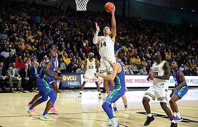 VCU’s rich basketball history features a lengthy list of impressive big men. Marcus Santos-Silva is the latest shining example.