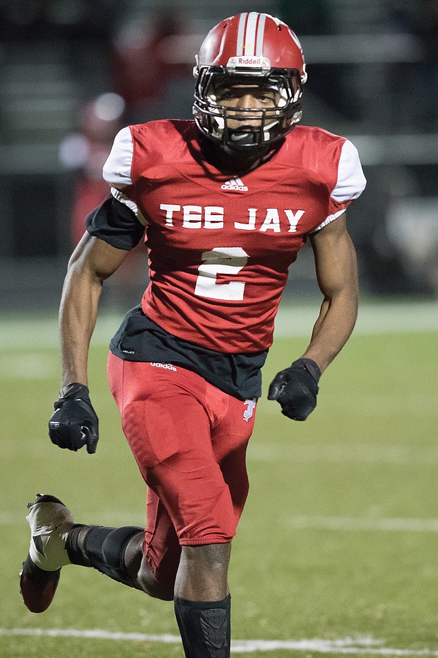 Thomas Jefferson High School’s Shamar Graham adds another 162 yards rushing and another touchdown to his statistics during the Vikings’ 30-28 victory last Friday over King William High School to clinch the regional title.
