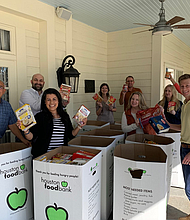 Team members from David Weekley Homes donated 14,000 pounds of Thanksgiving food items to Houston Food Bank to benefit families in need.