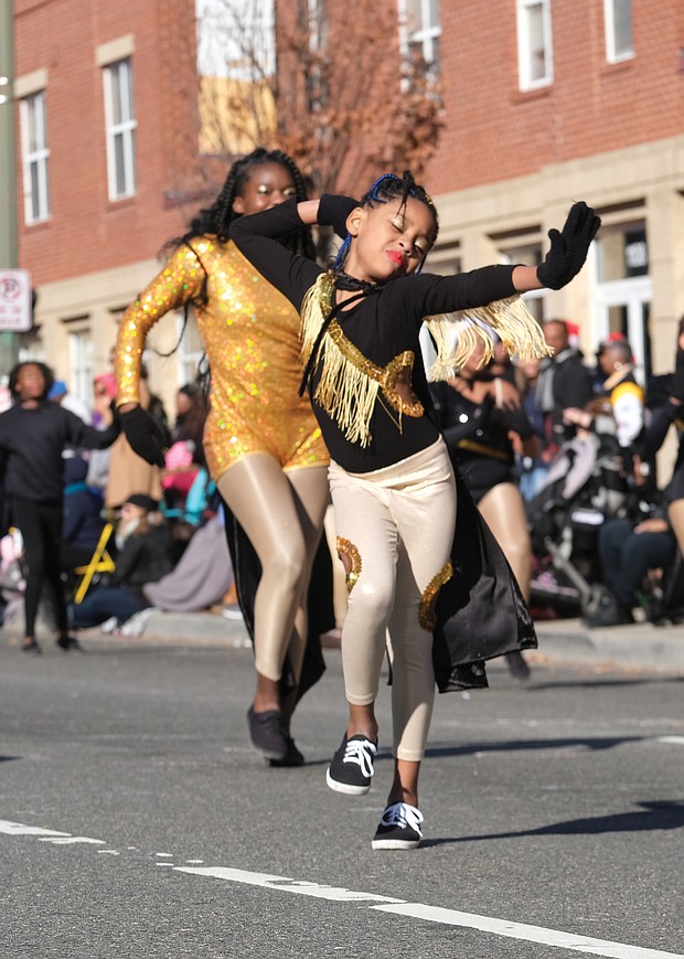Members of the Dangerous Royalettes Dance Team strut their stuff in the 36th Annual Christmas Parade last Saturday. Thousands of spectators lined the 2-mile route along Broad Street between the Science Museum of Virginia and 7th Street in Downtown to watch an array of floats, marching bands, character balloons bring the holiday spirit.