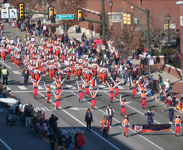 The Virginia State University Trojan Explosion Marching Band puts out a big sound as they march down the route into Downtown.