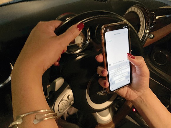Just holding a cell phone in your hand while driving could soon cost you $125 in the city of Richmond.