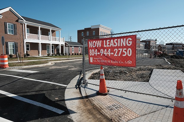 A “Now Leasing” sign adorns an entry to the Church Hill North development on North 31st Street off Nine Mile Road in the city’s East End. While no announce- ment has been made, the sign signals that the yearlong construction on the first phase of new apartments is coming to a close. The development was undertaken by The Community Builders of Boston in partner- ship with the Richmond Redevelopment and Housing Authority. The site is the former home of Armstrong High School, which was torn down to make way for the new residences. The first phase was announced on Oct. 30, 2018, when work began to include 60 family units and 45 apartments for seniors at a cost of about $26 million. Work on another 70 units was begun earlier this year, and those units are in various stages of completion. The total development is to include 256 units, including a few single-family homes. The project is the first step in the overhaul of the nearby Creighton Court public housing community. Some Creighton Court residents are to be moved to Church Hill North as planning for renovation or replacement of the 504-unit Creighton Court complex continues.