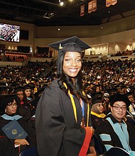 Jessica Brisco stands to be recognized as the top fall graduate at Virginia State University dur- ing fall commencement exercises last Saturday at the university’s Multi-Purpose Center. Ms. Brisco, who earned a 4.0 GPA, received a bachelor’s in information logistics technology. She was among 304 students who received their degrees during the ceremony.