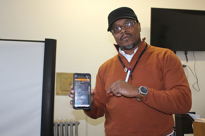 Richard Wooten, a longtime Chatham resident and retired Chicago police officer, has developed a new mobile app that’s free and allows a user to quickly contact 911 and up to five contacts, all at once, during an emergency. Photo credit: By Wendell Hutson