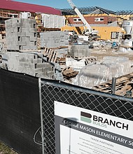 George Mason is one of three new schools under construction that are expected to be ready for the 2020-21 academic year. Building supplies are stacked and ready for use in the $38.4 million project. (Sandra Sellars/Richmond Free Press)
