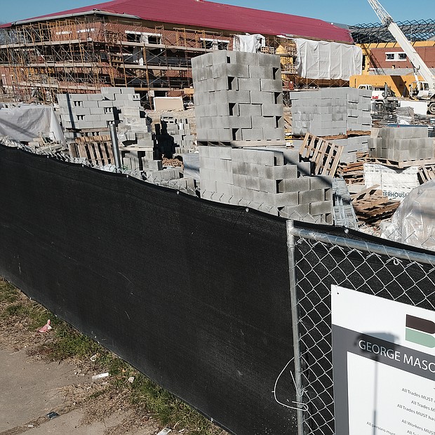 George Mason is one of three new schools under construction that are expected to be ready for the 2020-21 academic year. Building supplies are stacked and ready for use in the $38.4 million project. (Sandra Sellars/Richmond Free Press)
