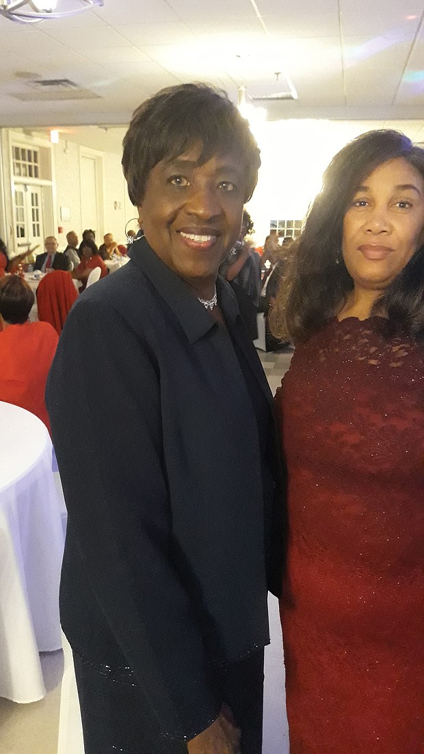 More than 100 people turned out for the 3rd Annual Holly Ball Gala sponsored by the Richmond Metropolitan Chapter of The Charmettes to raise money for cancer research. Chapter President Edna Rodwell, left, shares a moment with Melissa Dilworth, chair of the committee that staged the benefit dinner- dance on Dec. 27 at the Belmont Recreation Center in Henrico County.
