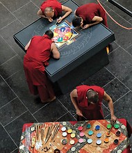 Tibetan Buddhist monks from the Drepung Loseling Monastery in India create a sand mandala in May at the Virginia Museum of Fine Arts to share Tibet’s sacred visual and performing arts in conjunction with an exhibit at the museum.