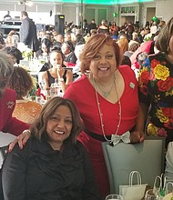 Event goers shares a smile for the camera before the Legendary Whispers performance