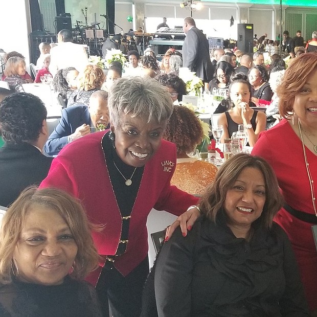 Event goers shares a smile for the camera before the Legendary Whispers performance