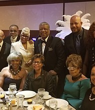 Gala Foundations Shirley and Edward Calahan enjoyed guests at the table of Carmen Lemons, CEO Lem's Barbecue.
