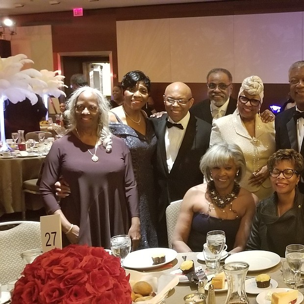 Gala Foundations Shirley and Edward Calahan enjoyed guests at the table of Carmen Lemons, CEO Lem's Barbecue.