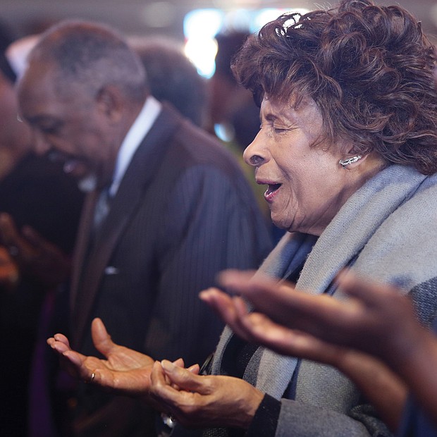 Nellie Crump Thomas prays at the New Year’s Day program at Fifth Baptist Church in the West End. The audience included leaders of Richmond City Council and the School Board, incoming Richmond state Sen. Ghazala Hashmi and other area elected officials. The Baptist Min- isters’ Conference of Richmond and Vicinity, led by the Dr. Emanuel C. Harris, hosts the event to remember the day when President Abraham Lincoln issued his Civil War proclamation on Jan. 1, 1863, freeing slaves in the South. The Rev. Ricardo Brown, co-pastor of Fifth Baptist Church, served as chair of the program that also raises money for area NAACP branches.