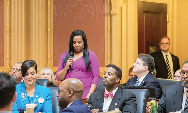 Delegate Charniele Herring of Alexandria, the new House majority leader, addresses the House chamber on Wednesday. Other delegates, from left, are Hala Ayala of Prince William County and C.E. “Cliff” Hayes Jr. of Chesapeake.