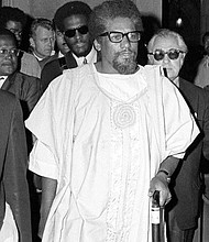 Activist James Forman walks in New York’s Riverside Church on May 11, 1969. Mr. Forman returned to the church after interrupting a service there earlier that month to deliver The Black Manifesto.
