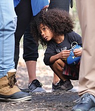 Young advocate
 Major West, 5, listens as speakers read letters from inmates and urge changes in the state’s laws and criminal justice system during last Saturday’s Virginia Prison Reform rally in Capitol Square. The youngster accompanied his family to the rally.