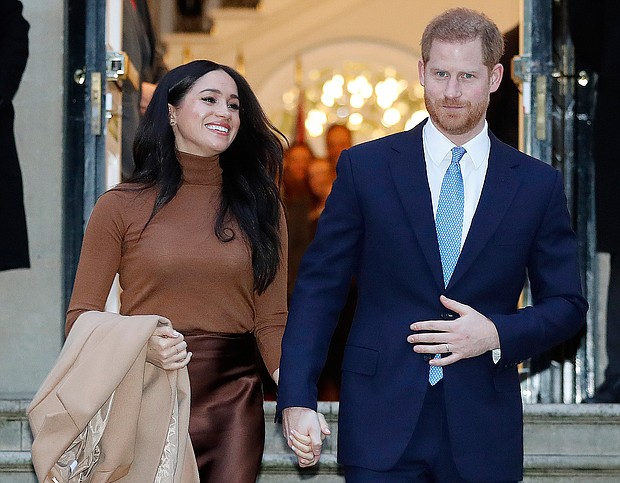 Britain’s Prince Harry and Meghan Markle, the Duchess of Sussex, leave the Canada House in London on Jan. 7 after their recent stay in Canada.