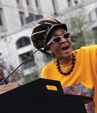 Janet “Queen Nzinga” Taylor of the Defenders for Freedom, Justice and Equality urges the crowd at last Saturday’s prison reform rally to spread awareness of the issues.