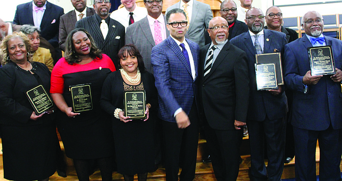 (from left) Spirit of Excellence Awards honorees Cassandra Holbert, L. Maria Asad, Lynette Stokes, the Rev. Stanley Watkins, and Robbins Mayor Tyrone Ward, were joined at a Jan. 20, 2020 Dr. Martin L. King Jr. event by (center) former U.S. Rep. Jesse Jackson Jr. and the Rev. Carl White Jr. Photo credit: By Wendell Hutson