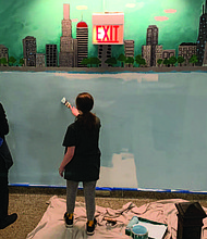 Volunteers painted a wall mural inside Bret Harte Elementary School during the University of Chicago’s MLK Day of Service on Saturday, Jan. 18. Photo courtesy of Eddie Quinones