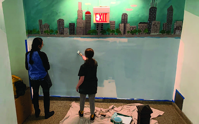 Volunteers painted a wall mural inside Bret Harte Elementary School during the University of Chicago’s MLK Day of Service on Saturday, Jan. 18. Photo courtesy of Eddie Quinones