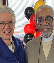 Cook County Board President Toni Preckwinkle congratulates US Congressman Bobby L. Rush on the opening of his re-election headquarters during Grand Opening celebration.