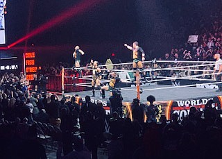 The Undisputed Era (Left to right) of Roderick Strong, Adam Cole, Bobby Fish, and Kyle O’Reilly complete their ring entrance.